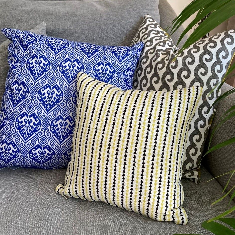 Waves, Blue block print and triangles cushions styled on a couch