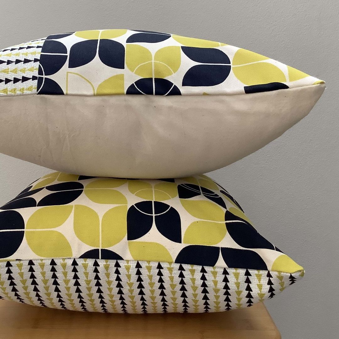 Stacked view of large and small geometrics and arches and triangles cushion cover showing front and back of each