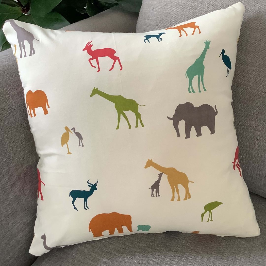 Out of Africa cushion cover on a couch
