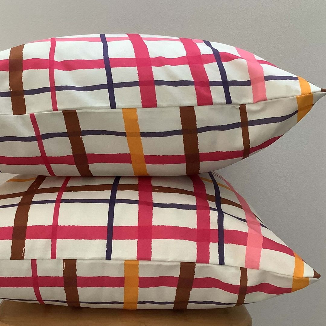 stacked view of jungle gingham cushion cover showing front and back