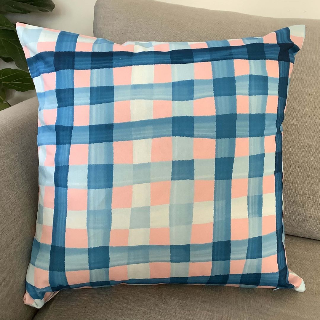 Gingham in Blue and Pink cushion cover on a couch