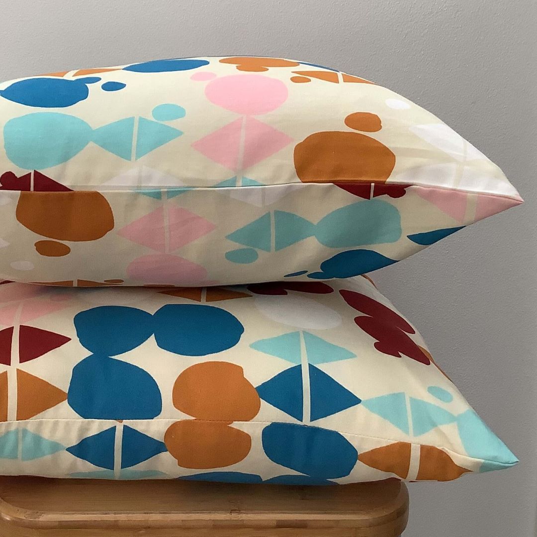 Side view of organic geometrics cushion cover showing front and back