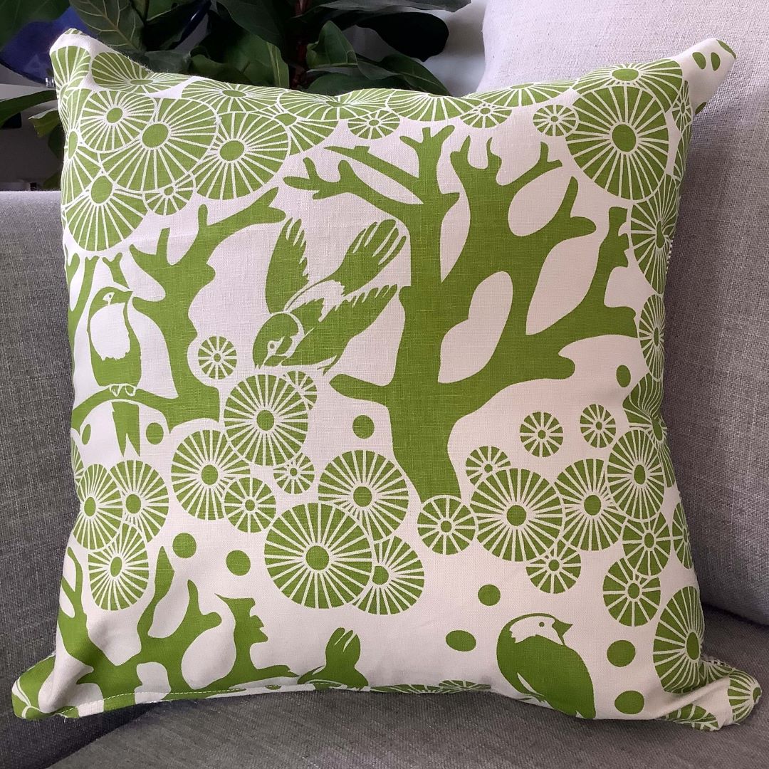 'Mikko' cushion cover in lime green on a couch