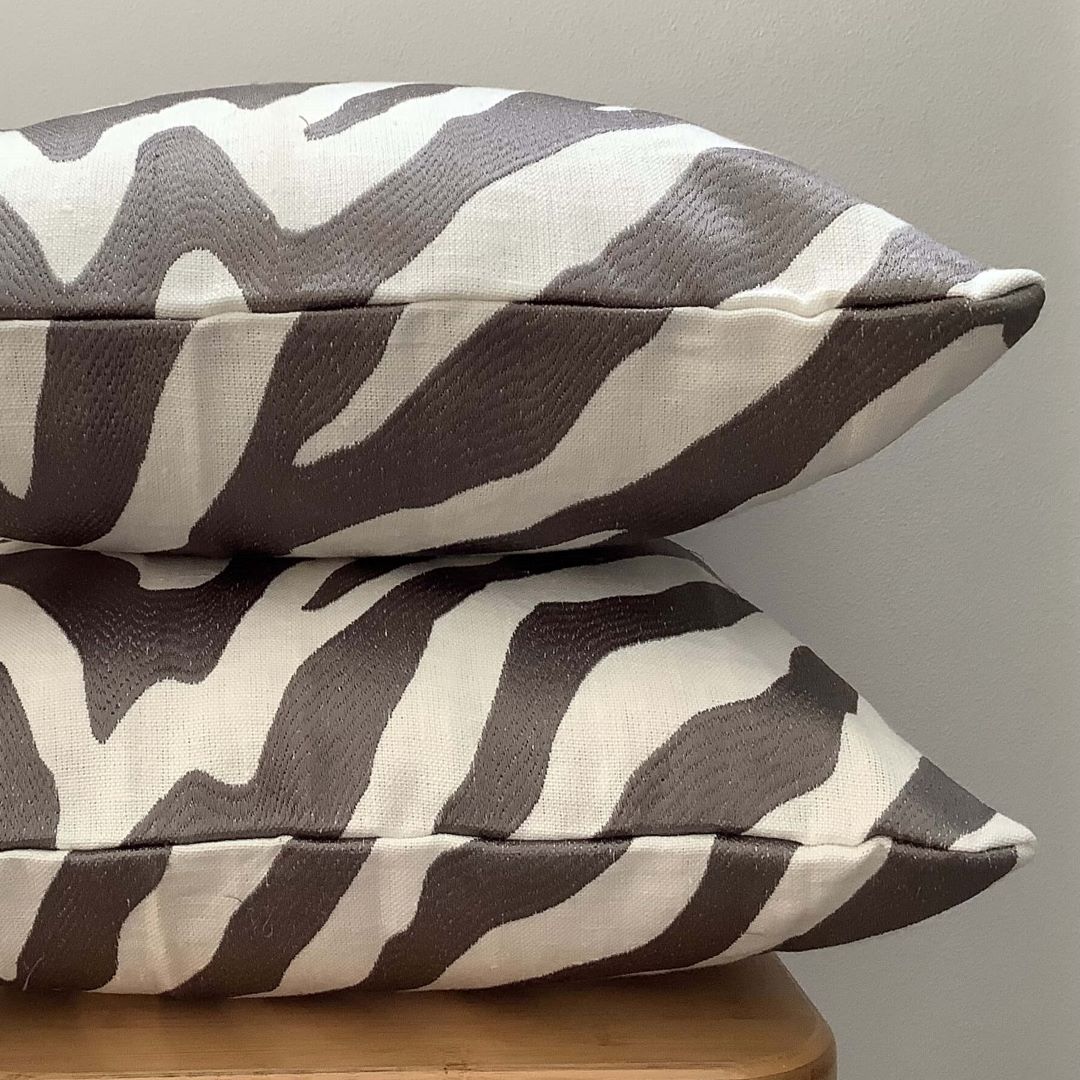Stacked view of Zebra cushion cover showing both sides